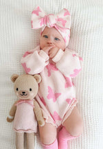 Flutter and Frills Knit Romper