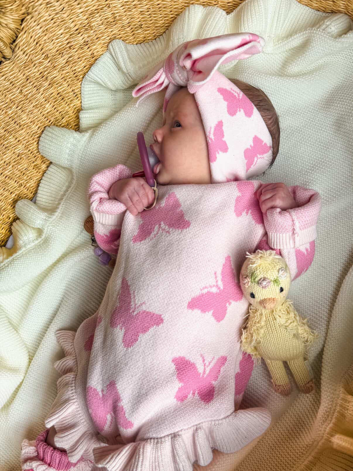 Newborn in Flutter and Frills Knit Romper with bow — Brave Little Lamb