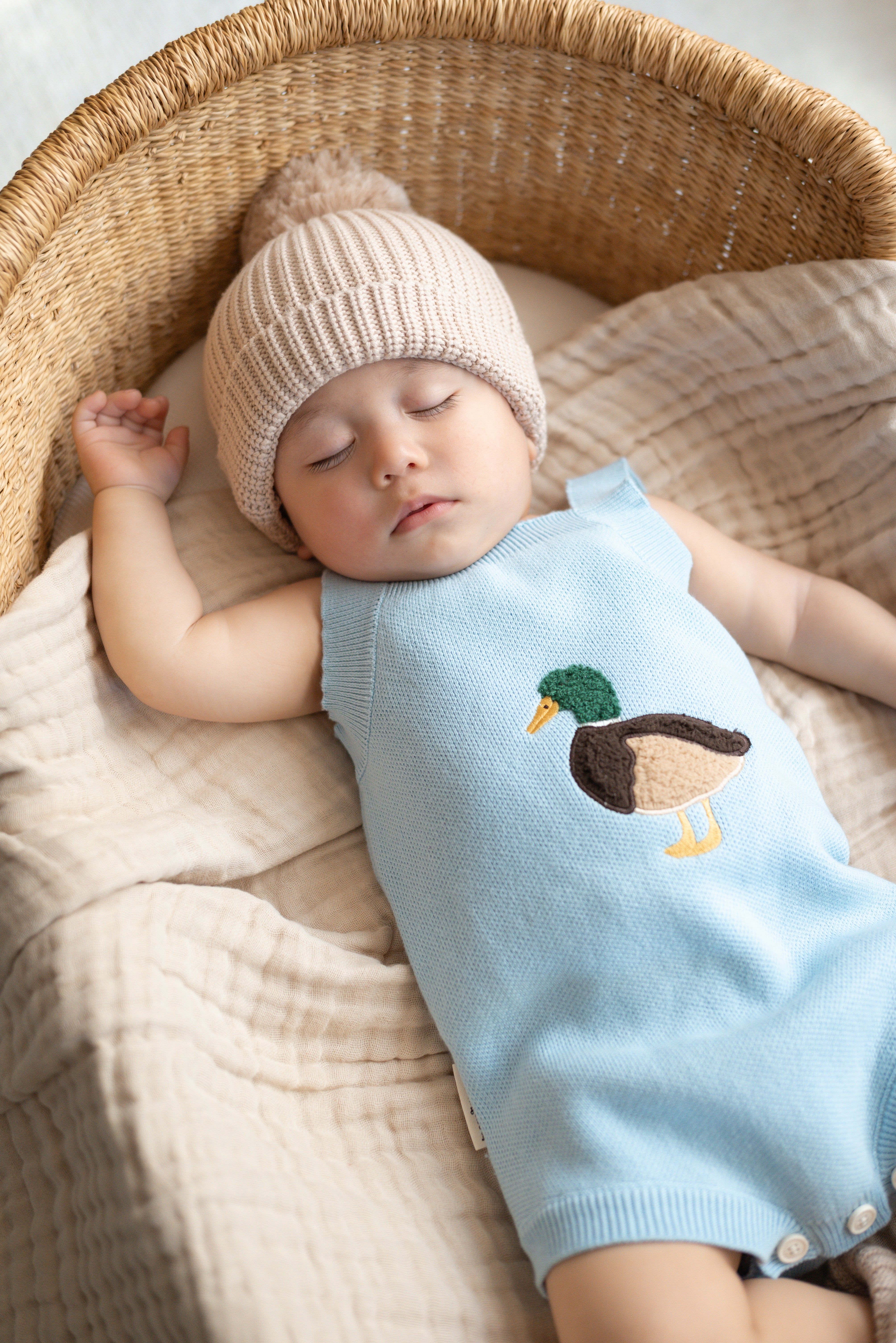 Little Mallard Knit Romper on baby with matching beanie and booties — Brave Little Lamb