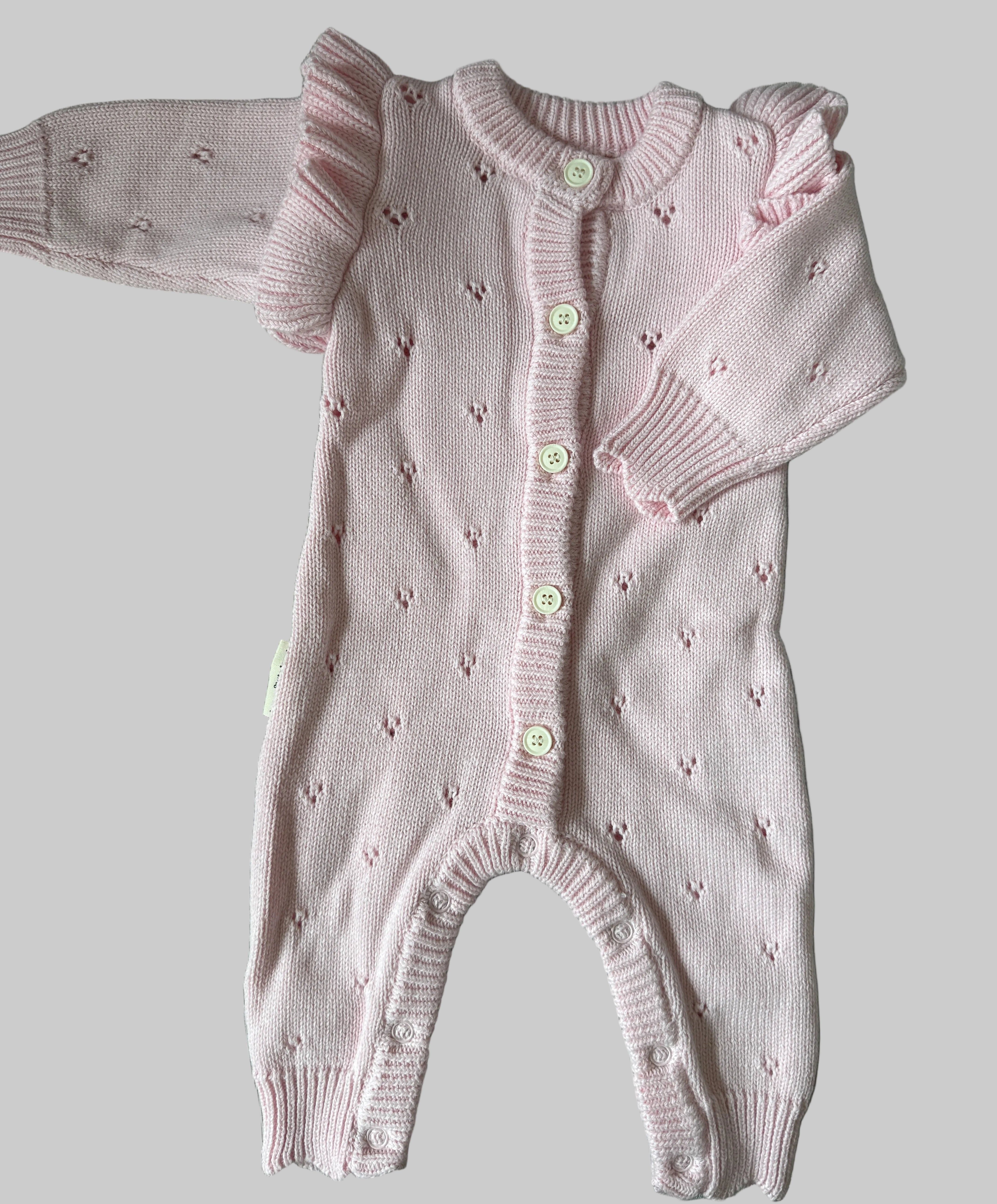 Blaire Pointelle Frill Romper flat lay showing snap closures and cotton pointelle construction — Brave Little Lamb