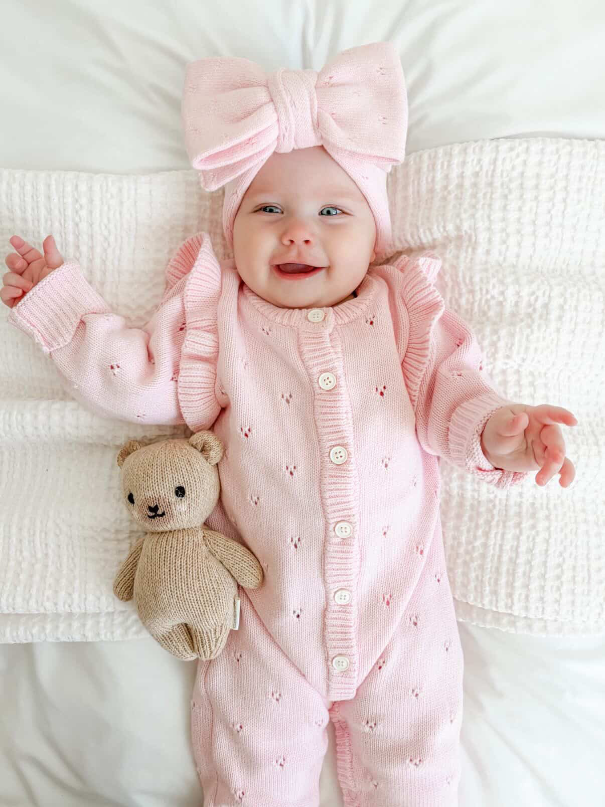 Knit Bow Headband in Peony pink — soft cotton large bow headband styled with announcement romper — Brave Little Lamb