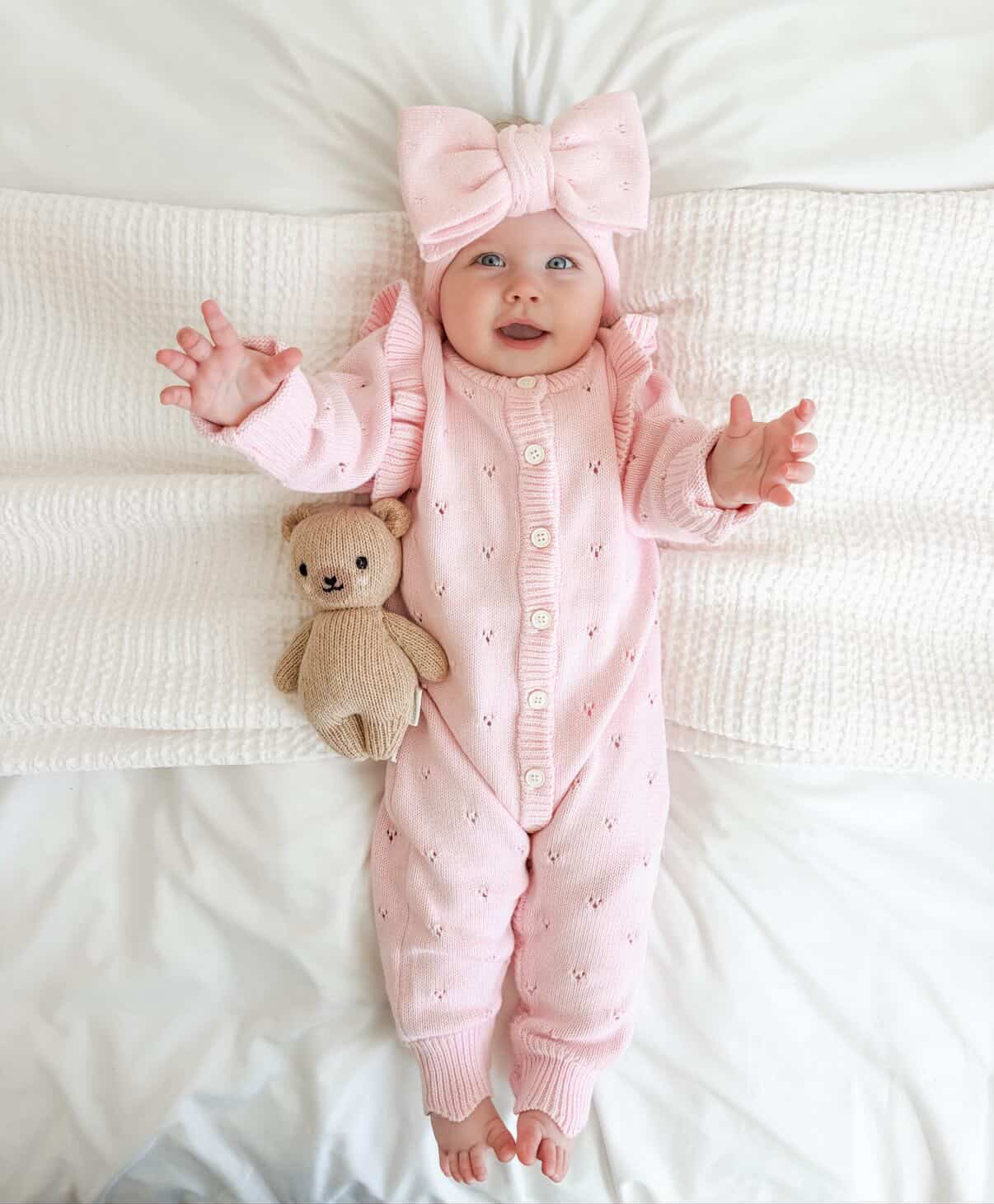 Blaire Pointelle Frill Romper in pink on baby — Brave Little Lamb