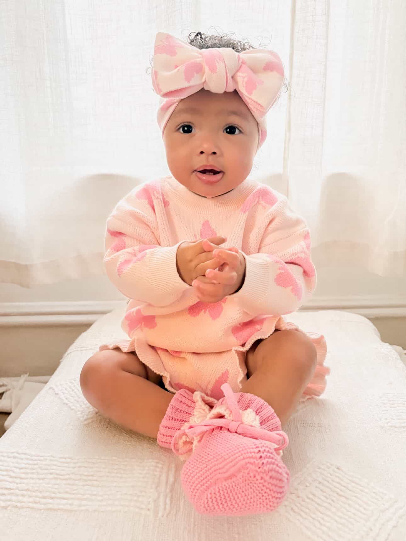 Toddler in Flutter and Frill Sweater with pink butterflies — Brave Little Lamb