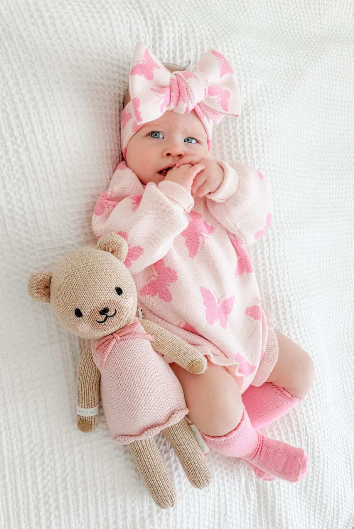 Flutter and Frills Knit Romper — pink butterfly detail cotton knit baby romper on infant — Brave Little Lamb