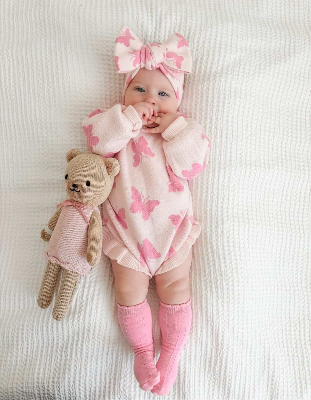 Flutter and Frills Knit Romper — pink butterfly detail cotton knit baby romper on infant — Brave Little Lamb