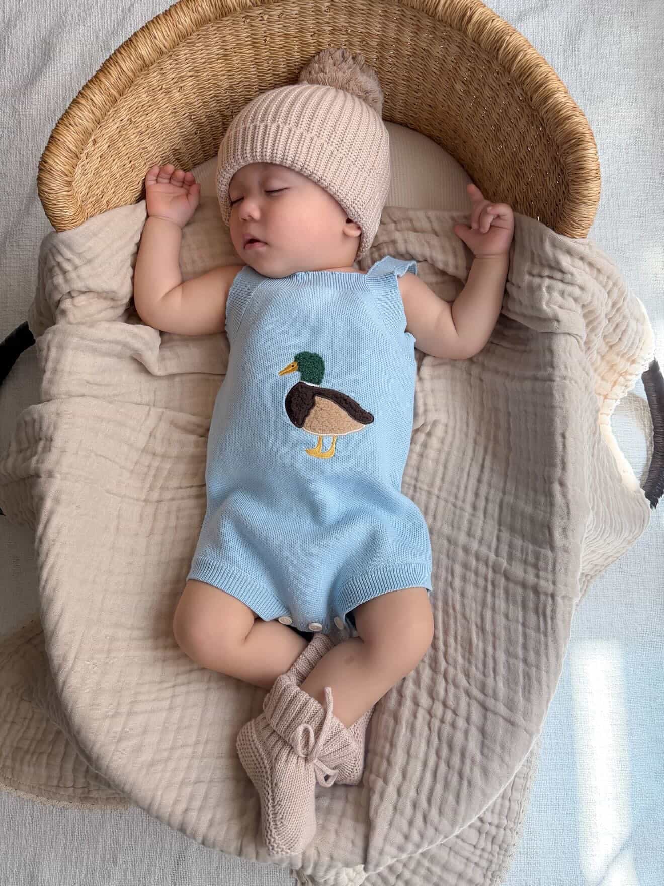 Little Mallard Knit Romper on baby with matching beanie and booties — Brave Little Lamb